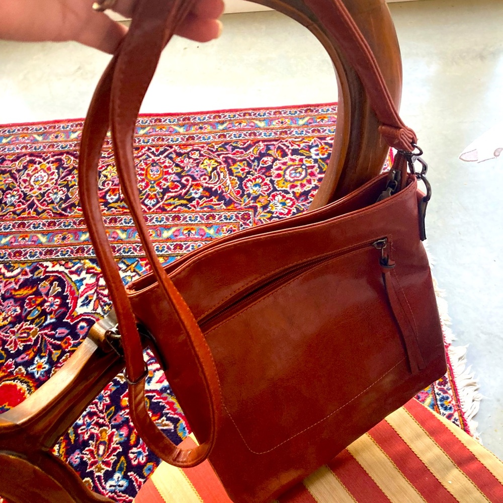 New 8 x12 envelope messenger bag. Brown faux leather. Some compartments